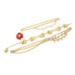 JOAN COLLINS CHAIN BELTS AND FLORAL ATTACHMENT A group of three gold tone and simulated pearl