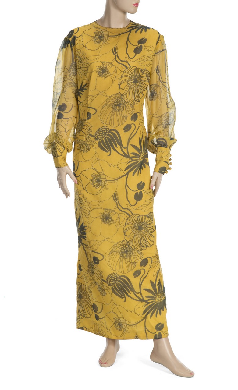 DAME AGATHA CHRISTIE OWNED DRESS An Agatha Christie owned dress. The yellow floor-length dress has a