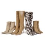 JOAN COLLINS DESIGNER HIGH HEEL BOOTS A group of four pairs of high heel boots owned by Joan