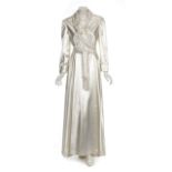 JOAN COLLINS NOLAN MILLER HOSTESS GOWN An ivory satin custom-made hostess gown owned by Joan