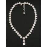 JOAN COLLINS WORN NEWBRIDGE SILVERWARE NECKLACE A cubic zirconia floral strand necklace with