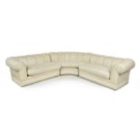 JOAN COLLINS SECTIONAL SOFA A large triform sofa.Approximately 30 by 200 by 24 inches