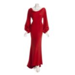 JOAN COLLINS RED GOWNS A pair of red gowns event worn by Joan Collins. The first is a slender silk