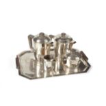 JOAN COLLINS SILVERPLATED TEA SET An Art Deco style five-piece tea set. Pieces marked "S(star) F/(