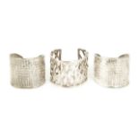 JOAN COLLINS MEXICAN SILVER CUFFS A group of three 925 wrist cuffs owned by Joan Collins.