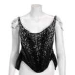 JOAN COLLINS CUSTOM-MADE BODICE AND WAIST CINCHER A black velvet boned bodice and waist cincher