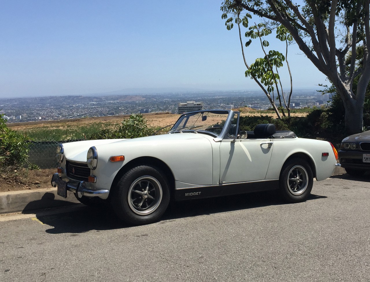 JOAN COLLINS 1973 MG MIDGET MARK III ROADSTER A 1973 MG Midget Mark III Roadster owned by Joan