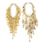 JOAN COLLINS PAIR OF NECKLACES A pair of gilt necklaces with dangling elements owned by Joan