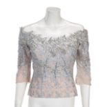JOAN COLLINS CUSTOM-MADE BODICE A custom-made silver lamé lace bodice worn by Joan Collins at a