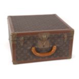 JOAN COLLINS LOUIS VUITTON TRAVEL CASE A square travel case, marked with serial number 934235.