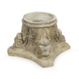 JOAN COLLINS DECORATIVE STONE PLANTER In the form of a Greek column base.18 1/2 by 27 by 27 inches