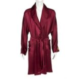HUGH HEFNER FRIARS CLUB ROAST SILK ROBE A silk maroon robe embroidered on the collar with "The NY