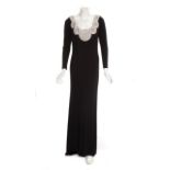 JOAN COLLINS EVENT GOWN A slender-fitting black jersey gown event worn by Joan Collins circa 2009.