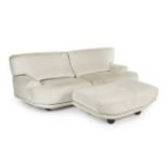 JOAN COLLINS PAIR OF DELLA ROBBIA SOFAS WITH OTTOMAN Covered in a beige chenille fabric.Sofas, 30 by