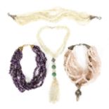JOAN COLLINS TUMBLED STONE NECKLACES A group of four multi-strand tumbled stone necklaces owned by