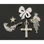 JOAN COLLINS RHINESTONE EMBELLISHED BROOCHES A collection of five rhinestone embellished brooches.