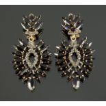 JOAN COLLINS WORN NEWBRIDGE SILVERWARE EARRINGS A pair of dangling earrings with crystal and black