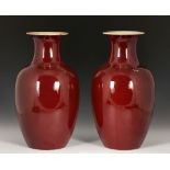 Pair of 19th C. Ox Blood Vases Pair of vases, China, 19th century, porcelain, with ox blood glaze,