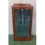 Walnut Single Door Glazed Display Cabinet with glass shelves, on deep plinth base with small