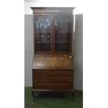 Figured Mahogany Bureau with fitted nest of shelves, pigeon holes & small drawers over 3 graduated