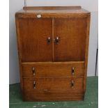 Art Deco Oak Low Boy with pair doors over 2 long drawers on plinth base with small upstand,