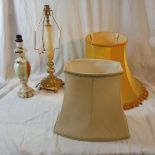 Onyx & Gilt Metal Table Lamp decorated with border winged cherubs, on 4 animal paw supports & Turned