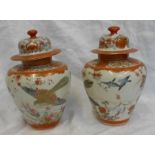 Pair Late C19th/Early C20th Kutani Vases with domed covers decorated with flying song birds (2)