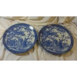 Pair Japanese Blue & White Transfer Decorated Chargers with figures in garden amongst prunus (2)