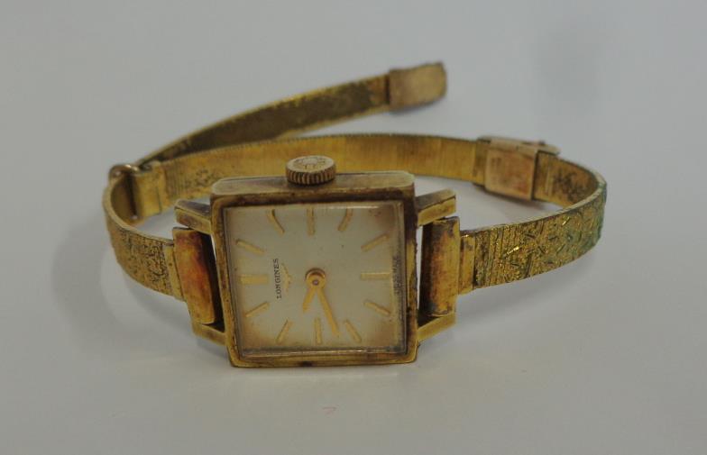 Ladies Rolled Gold Longines Wristwatch, engraved strap, square silvered dial, with original box