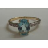 9ct Gold Aquamarine Ring with diamond shoulders, size O