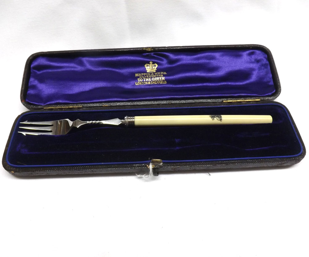 A case containing a single hallmarked Silver Pickle Fork with ivory handle, Sheffield 1889 (one fork