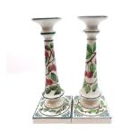 A pair of Wemyss Ware Tapering Candlesticks on square bases, 12” high 
Condition:
One has hairline