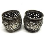 A pair of Indian white metal Napkin Rings of pierced form, both apparently unmarked