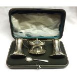 A George V cased Three Piece Silver Condiment Set of waisted tapering octagonal form, comprising