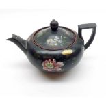 A 19th Century Wedgwood Teapot, polychrome decorated in colours with sprays of foliage, etc (spout