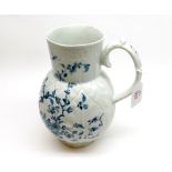 An 18th Century Worcester Dutch Jug, decorated with cabbage leaf and blue floral decoration, 8 ½”