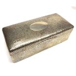 A late Victorian Silver Encased Cigarette Box of rectangular form with spot hammered decoration