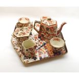 Ridgeways Old Derby pattern teaset comprising teapot, covered sugar basin, milk jug and three cups