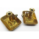 A pair of early 19th Century Brass Chamber Sticks of typical rectangular form, complete with Brass