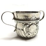 A George III Two-Handled Silver Loving Cup, with wrythen fluted and embossed decoration, cartouche
