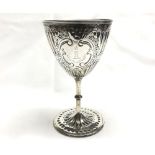 A George III small Silver Goblet of typical form with later punched and embossed decoration, bearing