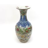A 19th Century Celadon baluster Vase, decorated with under glazed blue detail and also painted in