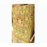 A Middle-Eastern Wall Hanging decorated with stitched design of minarets and stylised foliage in