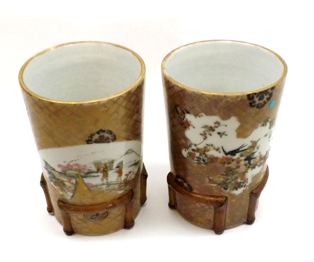 A pair of Oriental Cylinder Vases, the outer bodies painted in colours with fan-shaped cartouches