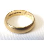 A mid 20th Century hallmarked 18ct Gold Wedding Ring, bearing internal presentation inscription
