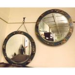 A pair of early 20th Century Round Bevelled Wall Mirrors, the frames decorated in blue Japanned