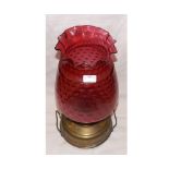 A large late 19th/early 20th Century Oil Lamp or Pulpit Warmer, fitted with a frilled cranberry