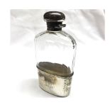 A late Victorian Facetted Glass Spirit Flask with detachable hallmarked Silver cup base and