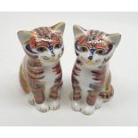 Two Royal Crown Derby Novelty Paperweights, modelled as seated tabby cats, complete with stoppers,