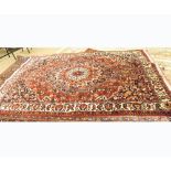 A 20th Century Pakistani or Caucasian Hand Knotted Wool Rug, decorated with stylised foliage and
